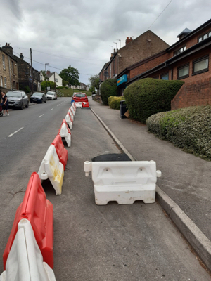 Photo of the temporary footpath widening on Dykes Hall Road