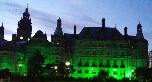 Sheffield Town Hall lit up in green