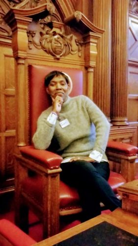 Bev Bennett sitting on Lord Mayor's special chair.